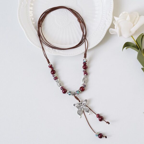 O1CN01p579UD1iNhs8kZqRL_2156504401-0-cib Wholesale Jewelry Butterfly Long Ceramic Beads Necklace