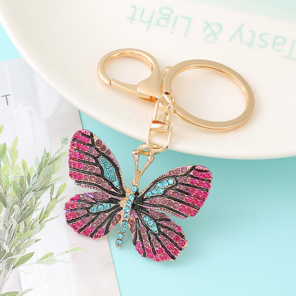 O1CN01pFprfz2Id7OnYKsyA_2102199308-0-cib Wholesale Butterfly Diamond Inlaid Alloy Keychains
