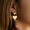 O1CN01pVXUjz1EhSWQmFQpr__2210915660383-0-cib Wholesale Three-dimensional Love High-grade Metallic Gold-plated Earrings