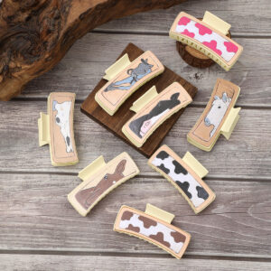 O1CN01pXUyhV1ftMW0908R6__3172764064-0-cib Wholesale Western Style Cow Pattern Horse Head Leather Hairpin Shark Clip Combination