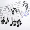 O1CN01q5xjlE1TQG1JhSf45_2207499512376-0-cib Wholesale Creative Musical Note Black Transparent Colorful Earrings