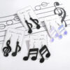 O1CN01q5xjlE1TQG1JhSf45__2207499512376-0-cib Wholesale Creative Musical Note Black Transparent Colorful Earrings