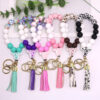 O1CN01qHl6NN1eDqyZHdgZX__2216524353838-0-cib Wholesale Cow Pattern Cow Head Silicone Beaded Wrist Keychain