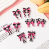 O1CN01qNY7VO2FMgTZvrUVp_2209539088866-0-cib Wholesale Halloween Skull Charm Bow Tie Ribbon Accessories FlatBack