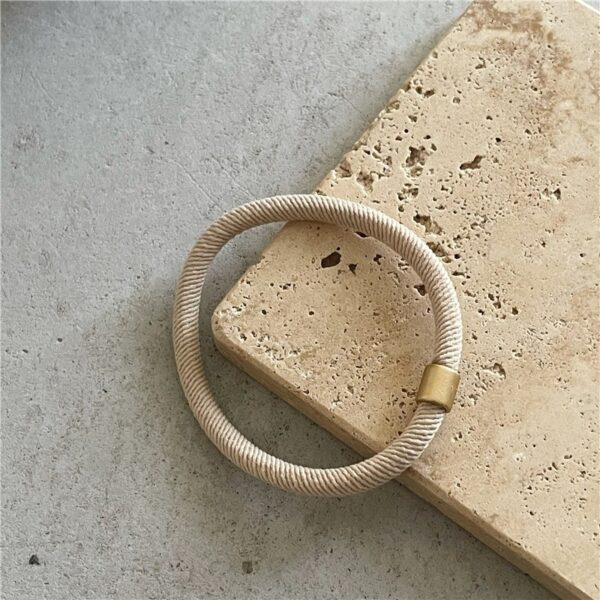 O1CN01qNpTLw1Eg5SxOndLy_2211832910380-0-cib Wholesale High Elastic Brown Threaded Gold Bead Hairband