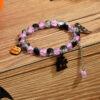 O1CN01qkJ9Mk1sweKLzfLQc__2213363735831-0-cib Wholesale Halloween pop flower wafer beads pumpkin castle bat tassel kids glass bracelet