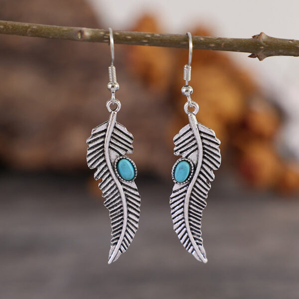 O1CN01qtb2nB1qyMWhr4GOb__2206372095564-0-cib Wholesale Vintage Turquoise Feather Alloy Earrings