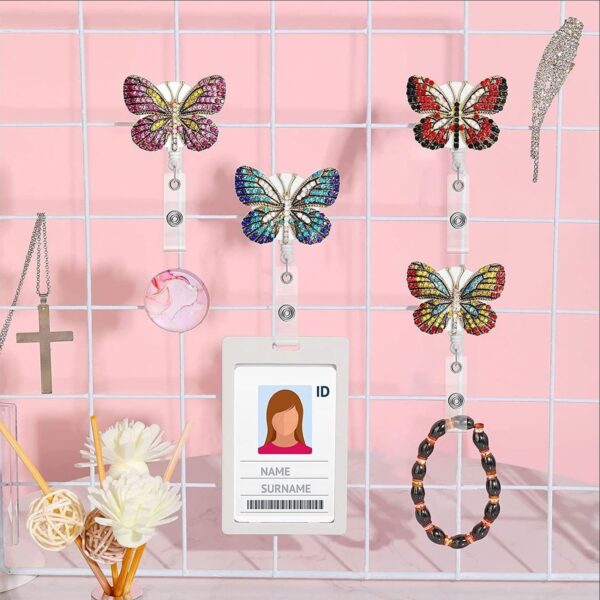 O1CN01rPow4e1Q2UQ4jX5kX_2213922901918-0-cib Wholesale Colored Metal Diamond Butterfly Emblem Scroll Retractable Keychain