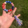 O1CN01ru4LMI1FT5dRoYiLm_2698260487-0-cib Wholesale Independence Day Wooden Beads Beaded Wrist Keychain