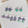 O1CN01s2CxNA27ScVwr9V3m_3843297796-0-cib Wholesale Space Cat Alien Acrylic Earrings