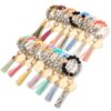 O1CN01s3fcgi1b726mNeX9w_2208367413417-0-cib Wholesale Blank Wooden Brand Fringed Silicone Beads Wrist Key Chain