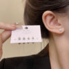 Wholesale Thread Cochlear Alloy Earrings