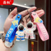 O1CN01saPORk2BkiaUKO6yQ_2210259538377-0-cib Wholesale Cartoon Waving Astronaut Soft Rubber Keychains