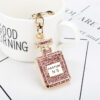 O1CN01sjsJWP1yypl6oXgCe_2211270936648-0-cib-1 Wholesale Rhinestone Car Full Diamond Perfume Bottle Pendant Alloy Keychain