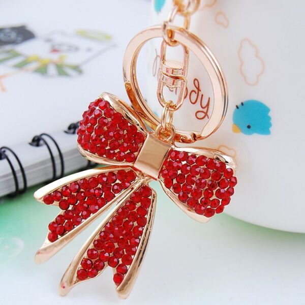 O1CN01stNBlR1anL79OQhdV_2208142583374-0-cib Wholesale Alloy Rhinestone Bow Keychain