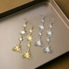 Wholesale Patchwork Triangle Sequin Radioactive Line Earrings