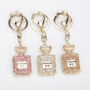 O1CN01tAOeT11yypl0R8FeY_2211270936648-0-cib Wholesale Rhinestone Car Full Diamond Perfume Bottle Pendant Alloy Keychain