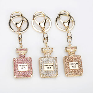 O1CN01tAOeT11yypl0R8FeY__2211270936648-0-cib Wholesale Rhinestone Car Full Diamond Perfume Bottle Pendant Alloy Keychain