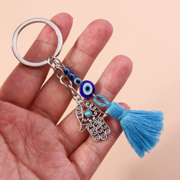 Wholesale Devil's Eye Hollow Palm Tassels Zinc Alloy Keychain