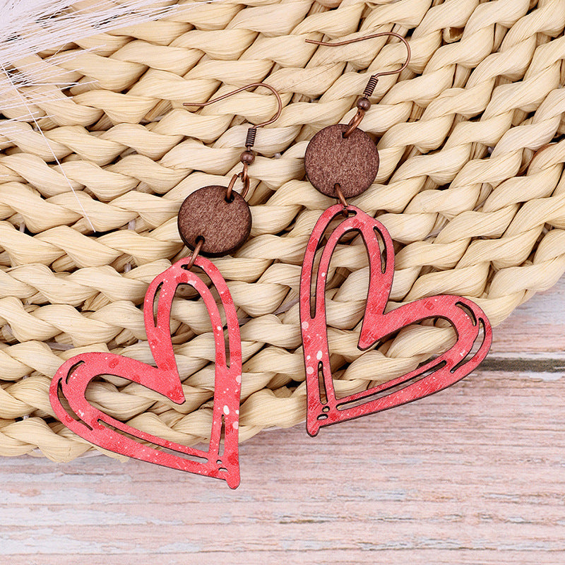 Wholesale Valentine's Day Fashion Hollow Heart Wood Slice Women's Earrings