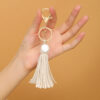 O1CN01tb3fC81ftMPUNr74S_3172764064-0-cib Wholesale Leather Tassel Keychains