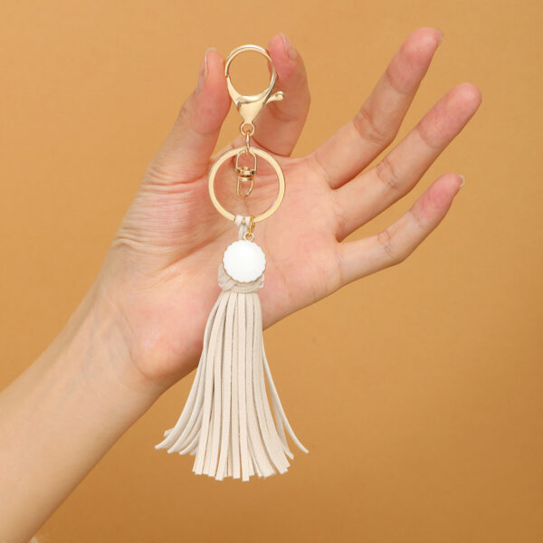 O1CN01tb3fC81ftMPUNr74S_3172764064-0-cib Wholesale Leather Tassel Keychains