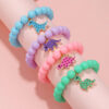 O1CN01uBuz0Q1Gvm4E7XNKr_2208052480685-0-cib Wholesale Dinosaur Pendant Acrylic Beads Bracelet Set of 4
