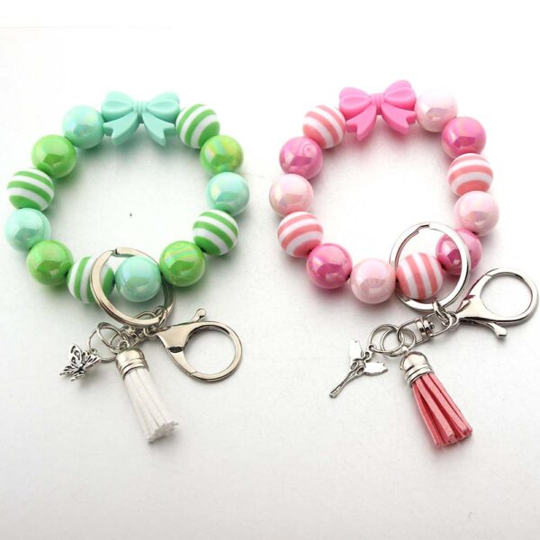 Wholesale Tassel Dragonfly Bull Head Lion Love Angel Acrylic Wrist Keychain