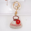 O1CN01uOMFSl24ETKEYKUet_2208216907359-0-cib Wholesale Diamond Bag Shape Alloy Keychain