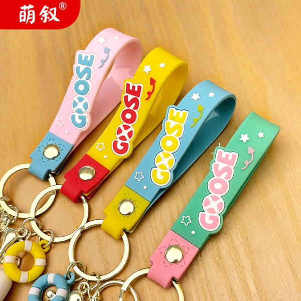 O1CN01uV9NUG2BkifoxH5WD_2210259538377-0-cib Wholesale PVC Cute Doll Goose Cartoon Keychain