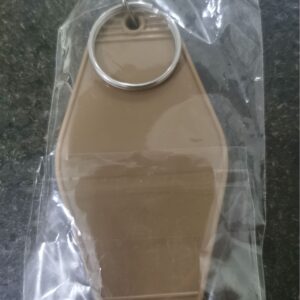 Camel-colored room key card