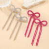 Wholesale Super Flash Claw Chain Bow Tassel Earrings