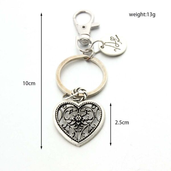 O1CN01uq82rp1bYW1PsM6Cq_2216822363477-0-cib Wholesale Men's Heart Charm Letter Keychain