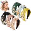 Wholesale of New Pearl Knotted Wide Edged PU Hair Bands