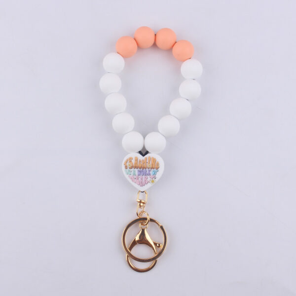 O1CN01vgTzCj1NrNi8tBWVn_2214899881623-0-cib Wholesale Cartoon Love Printed Silicone Beaded Wrist Keychain
