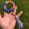 O1CN01w0i4WN1FT5dKsQhWw_2698260487-0-cib Wholesale Independence Day Wooden Beads Beaded Wrist Keychain