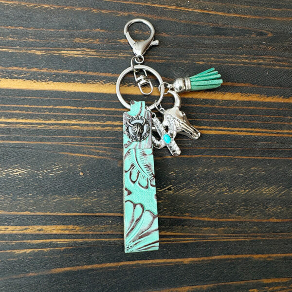 O1CN01w5jOPf1zp38eJBunX_2215459036762-0-cib Wholesale Western Cowboy Vintage Genuine Leather Turquoise Cowhide Keychain