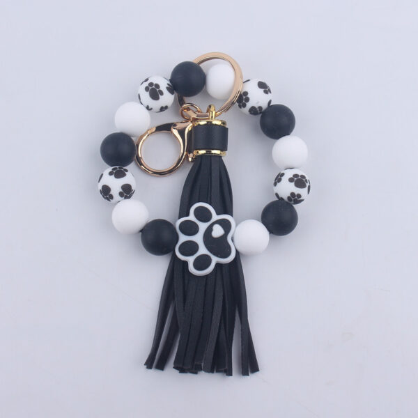 O1CN01wCEcYX1NrNk6GwxWU_2214899881623-0-cib Wholesale Dog Paw Silicone Beaded Wrist Keychains