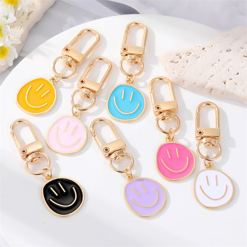Wholesale Colorful Oil ip Smile Alloy Keychains