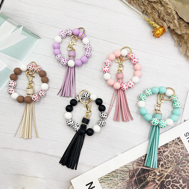 Wholesale Western Style Cow Grain Wood Beads Silicone Handmade Keychain Bag Key Aessories