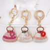 O1CN01wf7GwE24ETKF2y88n__2208216907359-0-cib Wholesale Diamond Bag Shape Alloy Keychain