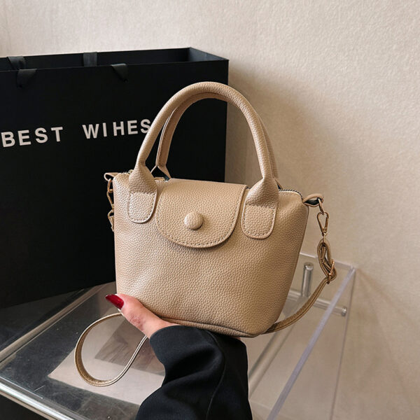 O1CN01woJdo11i0o99O2zm6_2213333414351-0-cib Wholesale Fashion Retro Handheld Solid Color Bucket Bag