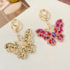 O1CN01x7wWB12A5D95sQUnp_1874418151-0-cib Wholesale Zinc Alloy Crystal Full Diamond Butterfly Keychain
