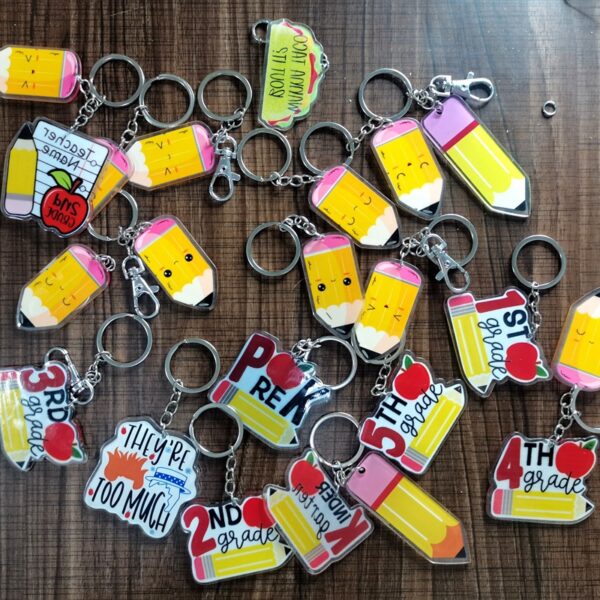 O1CN01x9COJn1yWtjF04Smb_2215124666587-0-cib Wholesale Acrylic Teacher's Day Backpacks, Pencils, Smiling Faces, Keychain Pendants