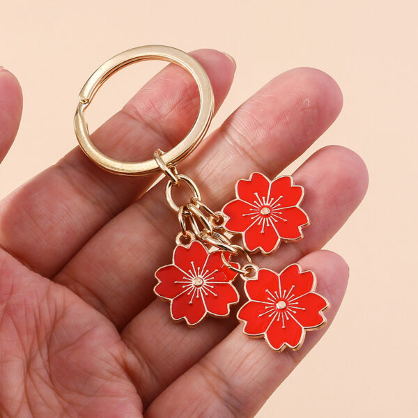 O1CN01x9rp1P2KzDhnOw9wW_2211051639627-0-cib Wholesale Cherry Blossom Metal Keychain Handbag Decoration Pendant Accessories