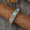 O1CN01xEoipr1qyMiTJ7f4B_2206372095564-0-cib Wholesale Bohemian Vintage Style Inlaid Turquoise Open Adjustable Alloy Bracelet
