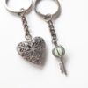 O1CN01xJ2wXF1nr5grWtqYU_2212841575142-0-cib Wholesale Alloy Glow Heart Keychain