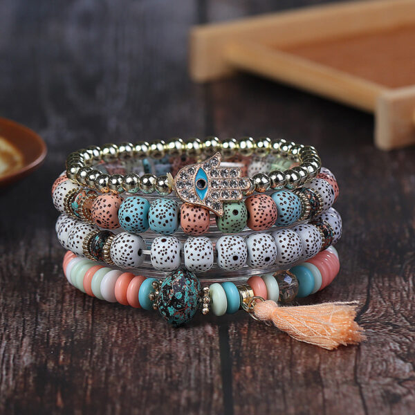 O1CN01xQ0vmM1LkOODNACDv__2215904591337-0-cib Wholesale Tassel Demon Palm Pendant Multi Layered Pendant Glass Elastic Bracelet