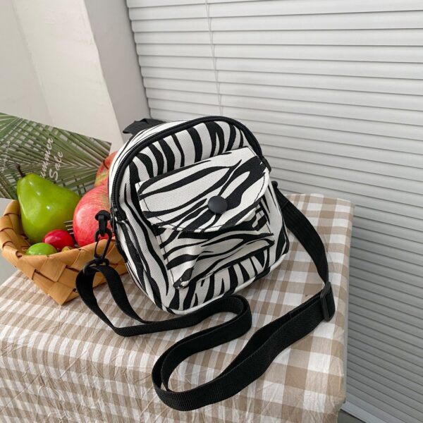 O1CN01xYS1PI1T2R84BzFBG_2209219222324-0-cib Wholesale Cow Pattern Mobile Phone Bag Crossbody Canvas Bag