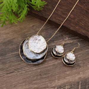 Black, white and gray ring set-gold